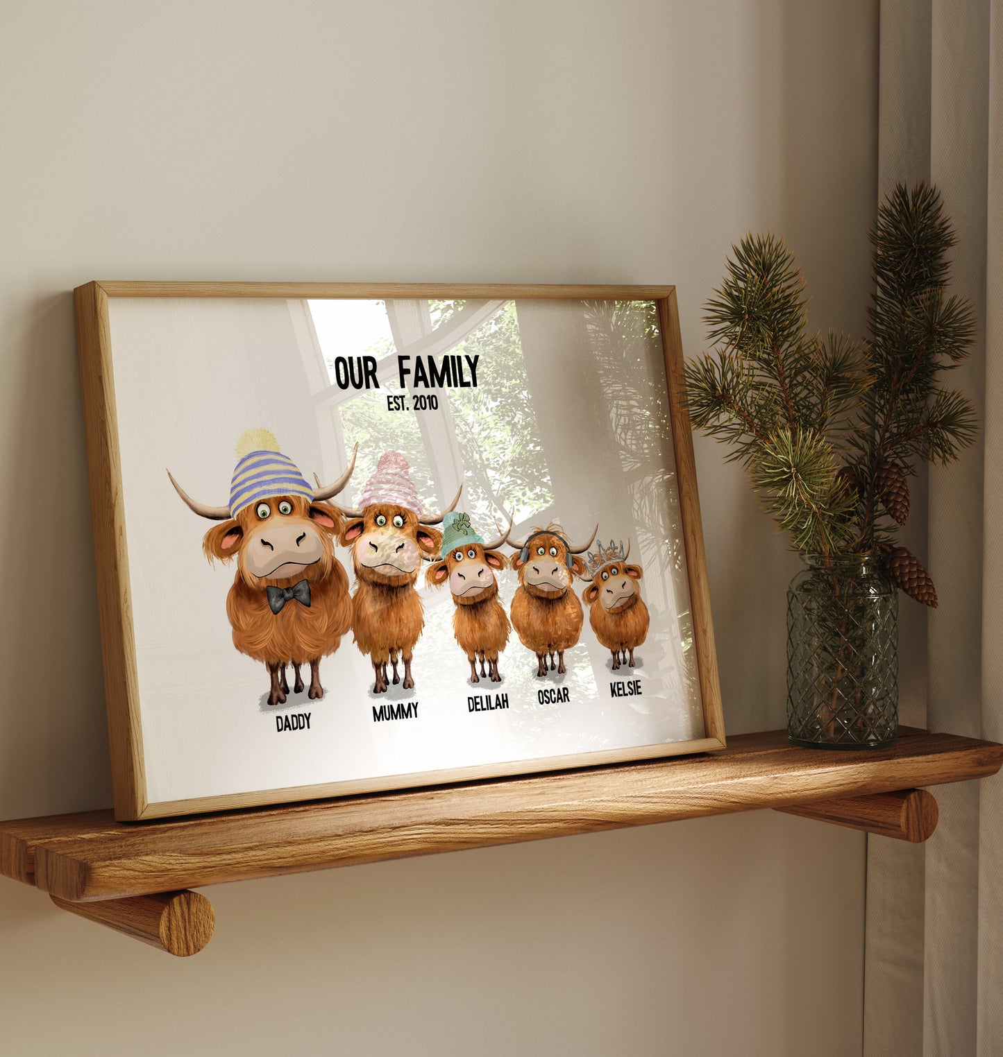 personalised artwork with cartoon Highland cows and text on a light background with individual names