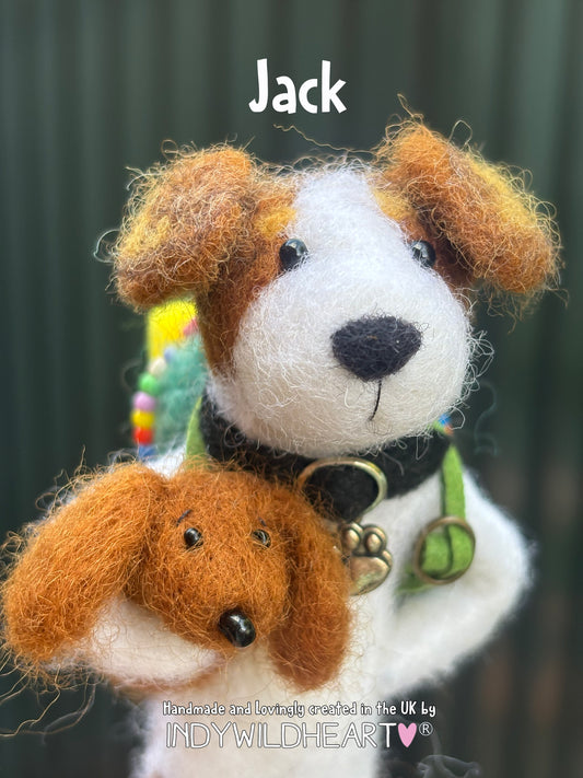 A handmade needle felted wool dog named Jack, with brown and white fur, black eyes, a black collar with gold paw charm, and a green rucksack straps, shown against a dark green background with text overlays.